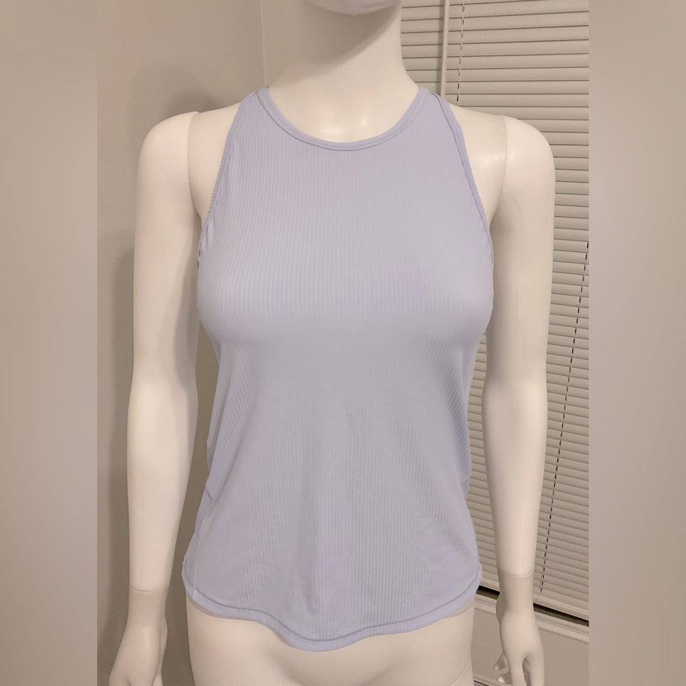 Lululemon women's light blue top. Used. Very good condition. size 4